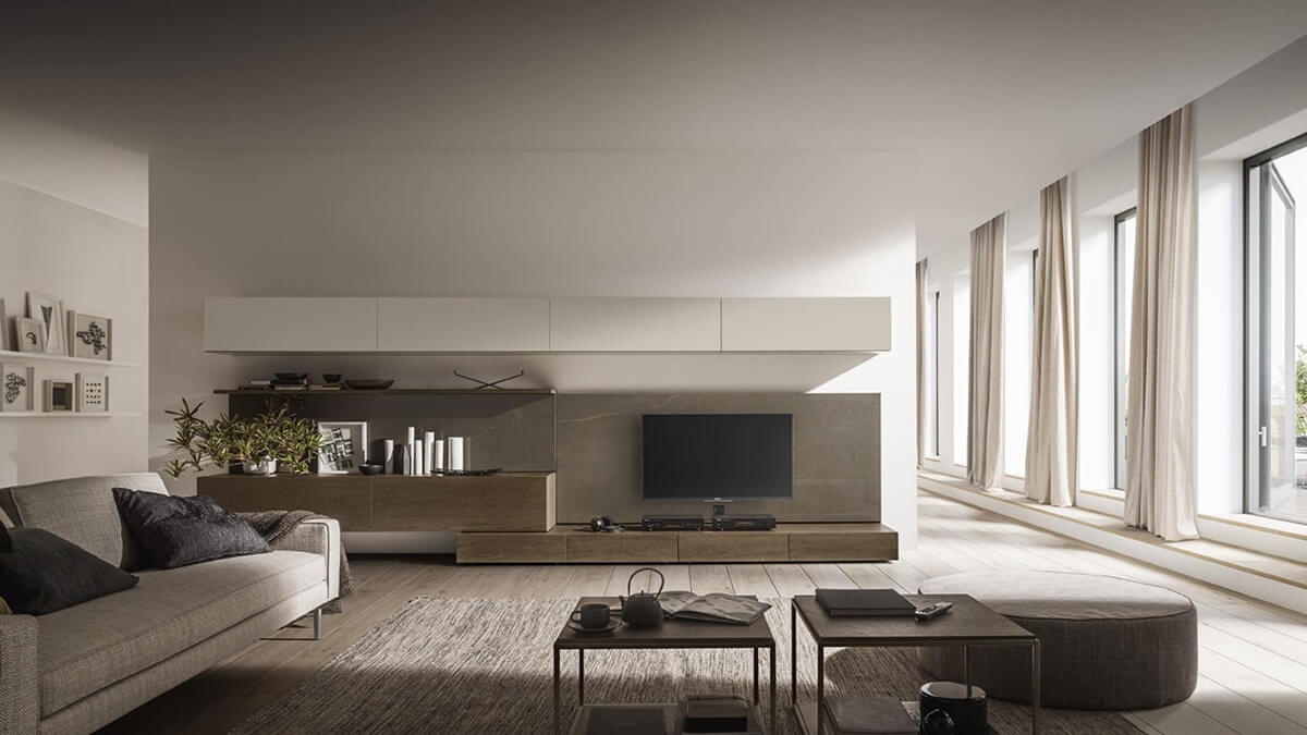 Мінімалістичний дизайн вітальні з акцентом на простір, функціональність та відсутність зайвих деталей.