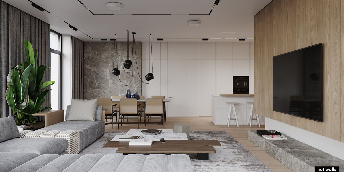 Сучасна вітальня з великими панорамними вікнами, що забезпечують багато природного освітлення.