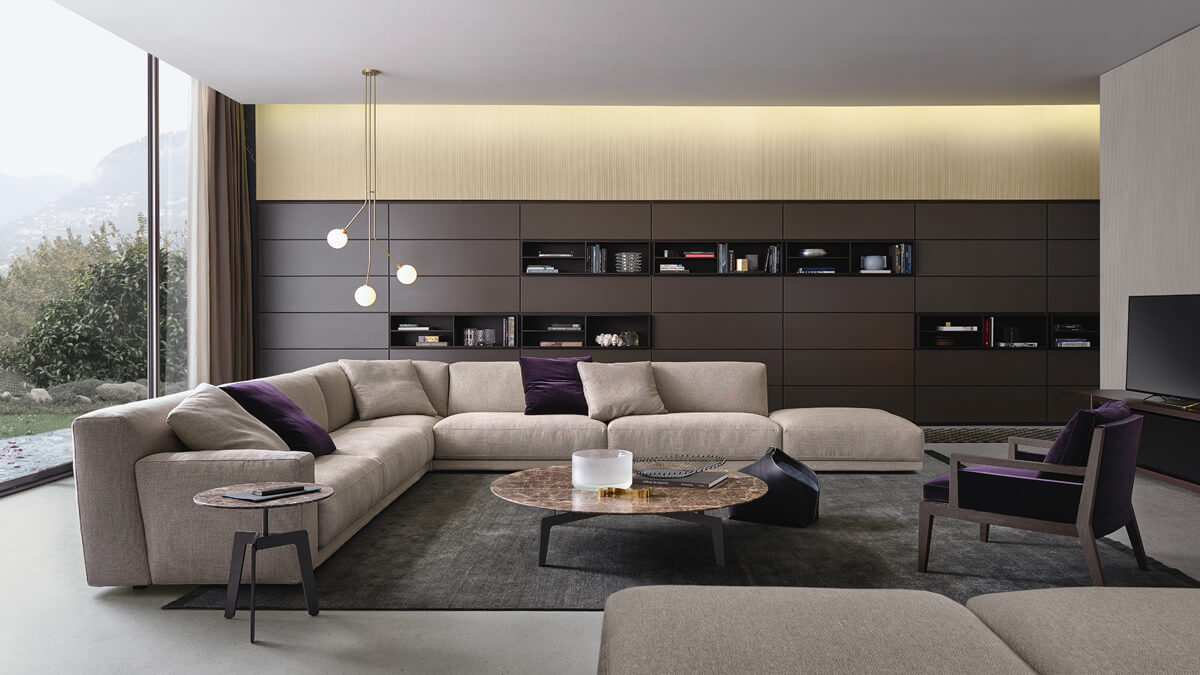 Сучасний дизайн вітальні з модульним диваном та зонуванням для комфорту та стилю