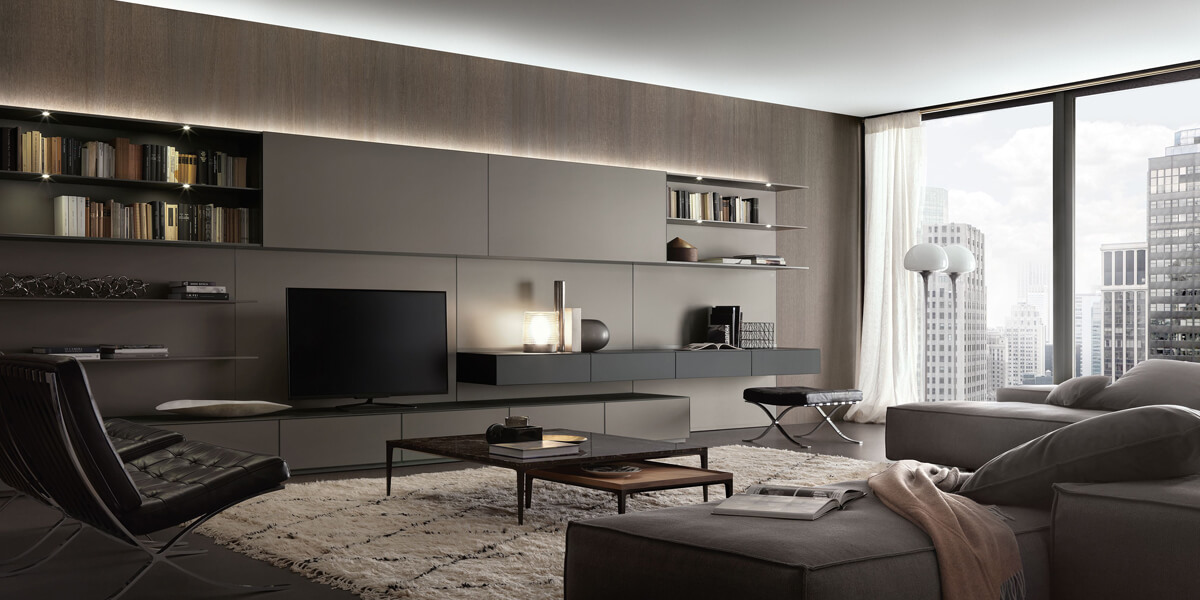 Світла вітальня в сучасному стилі з мінімалістичним декором та просторими вікнами.