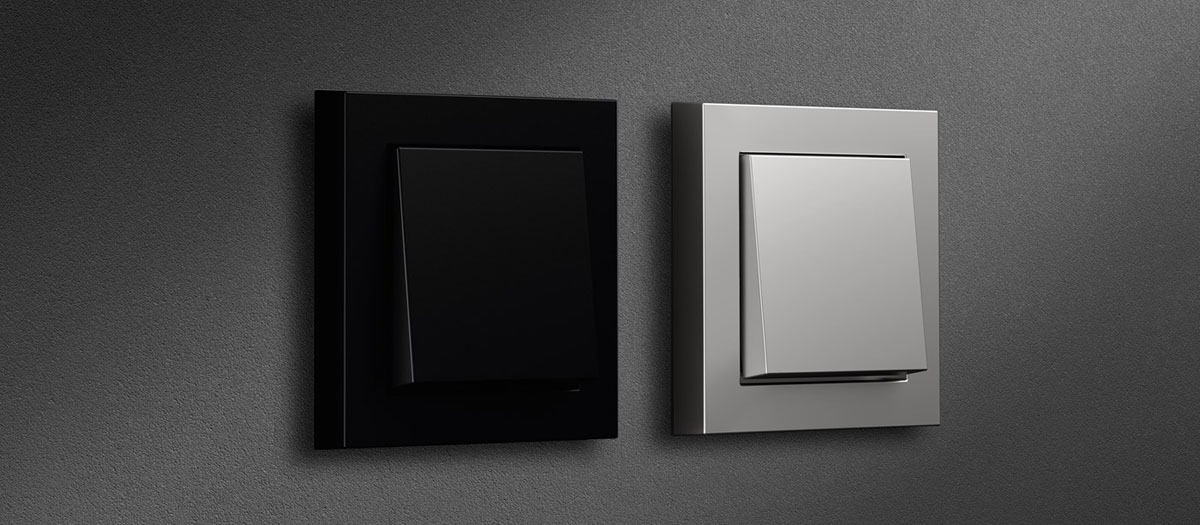 Елегантний диммерний вимикач з металевою рамкою для сучасного дизайну інтер'єру.