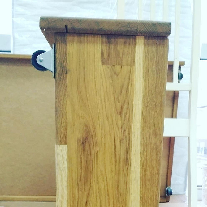 Виготовлення ящика під ліжко своїми руками з дерев'яних дощок в маленькій квартирі.