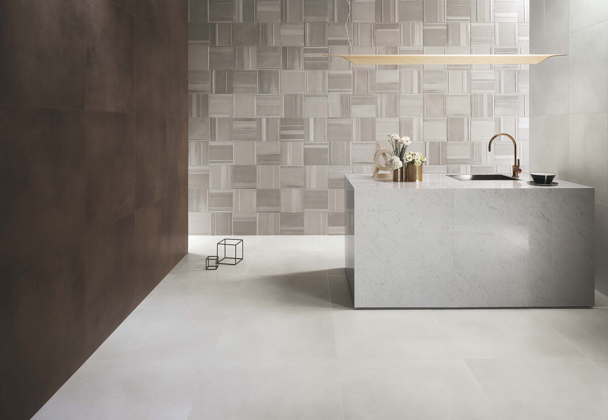 Укладання керамічної плитки на підлогу: вибір між керамогранітом та керамікою.