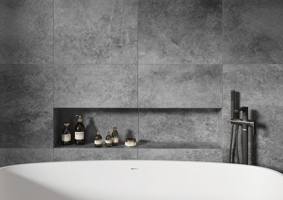 Інтер'єр ванної кімнати в сірих тонах з використанням різних текстур плитки.