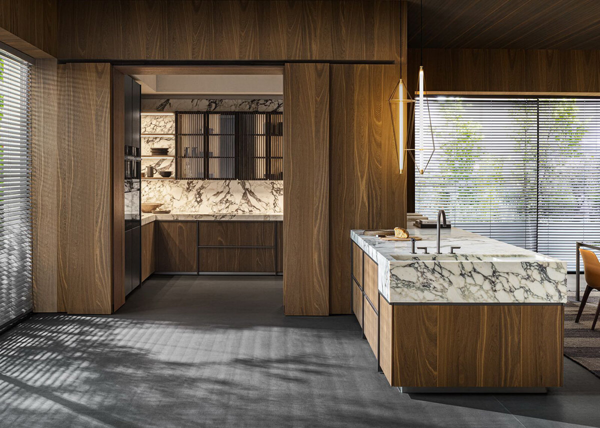 Інтегрована техніка: затишок Сучасна прихована кухня з інтегрованою технікою та освітленням, вдале маскування кухні.