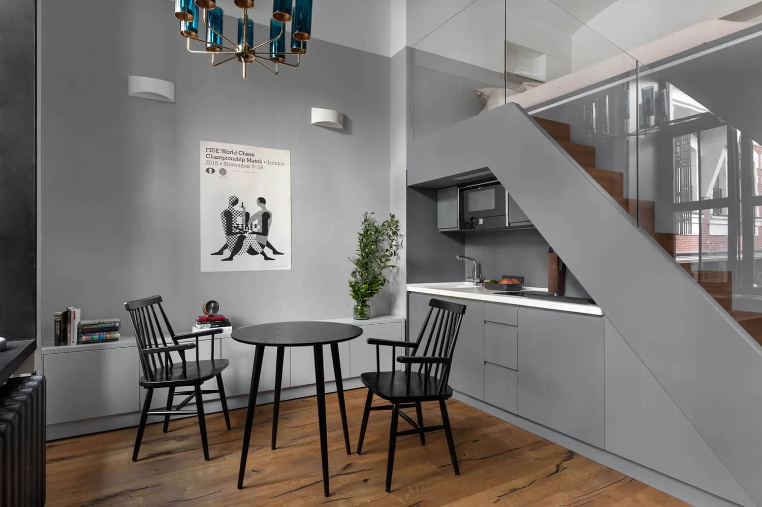 Кухня з барною стійкою Стильний кухонний інтер'єр двокімнатної квартири з сучасною барною стійкою.