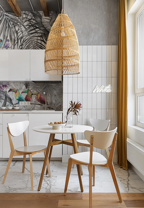 Затишна вітальня з білими меблями: диван, крісла та журнальний столик.