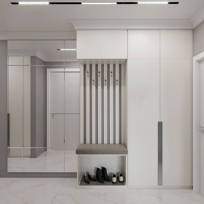 Інтер'єр спальні з білими меблями, акцент на кольоровому текстилі та декорі.