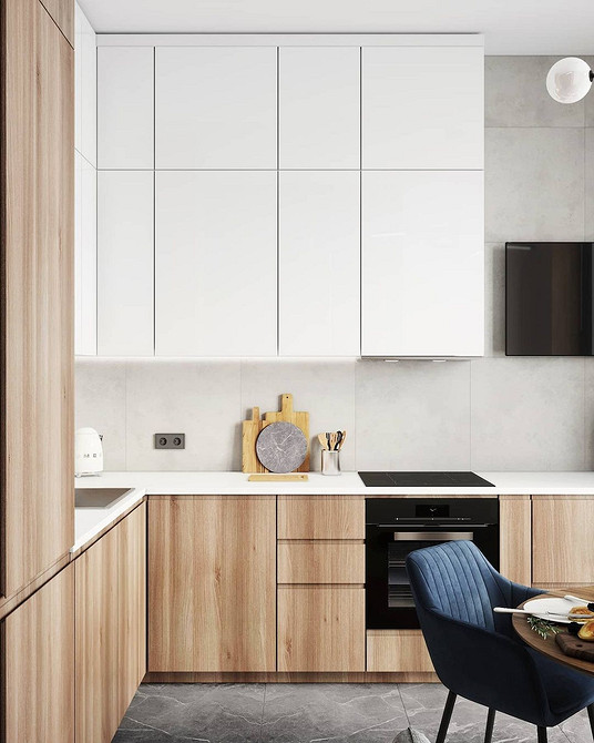 Сучасний дизайн білої кухні 2026 з мінімалістичними шафами та барною стійкою.