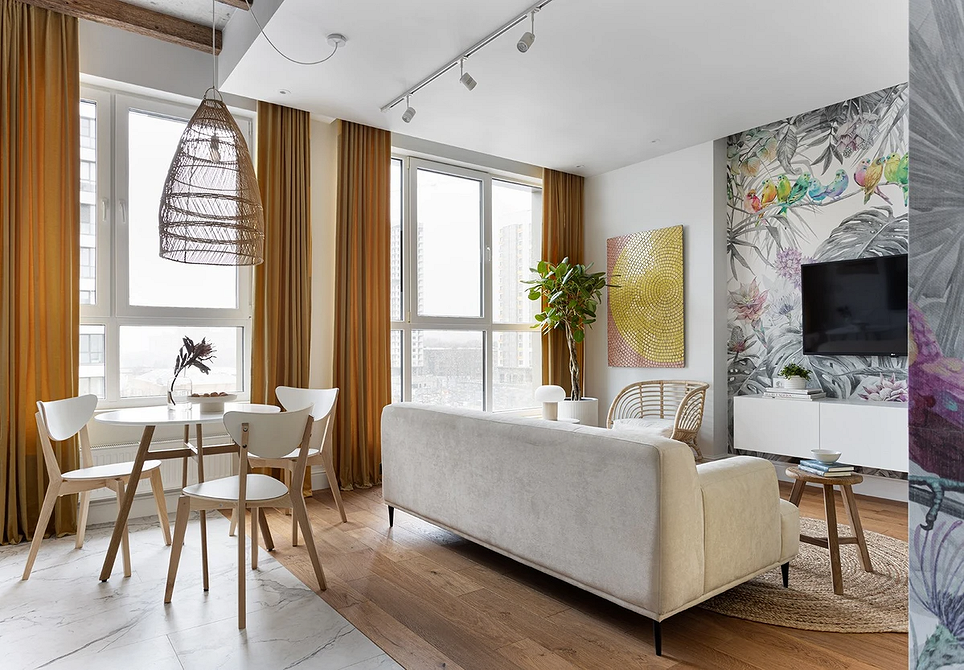 Кухня в білих тонах з обідньою зоною: світлі меблі створюють простір.