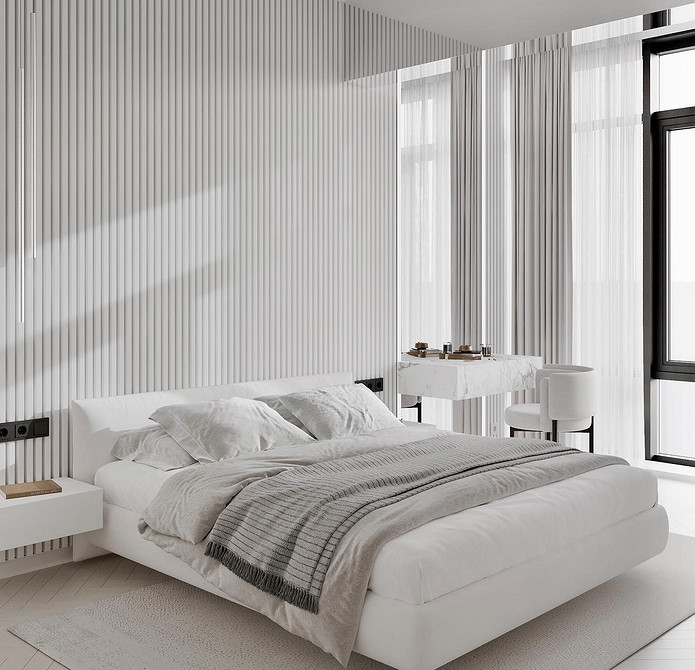 Інтер'єр спальні з білими меблями та акцентом на рожевий колір у постільній білизні