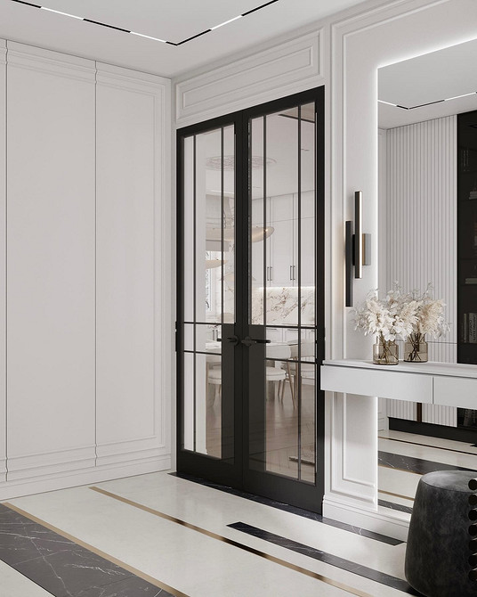 Світла спальня з білими тумбочками та яскравими лампами, що створюють атмосферу затишку.