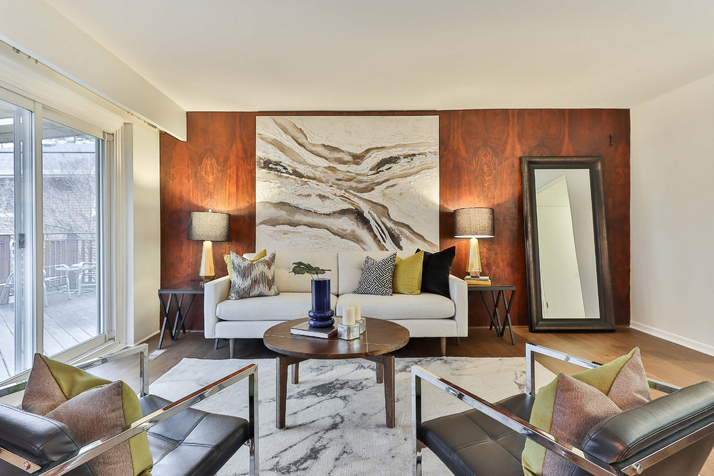 Сучасний стиль Сучасна вітальня з білим диваном, сірою стіною та стильним декоративним освітленням 2026.