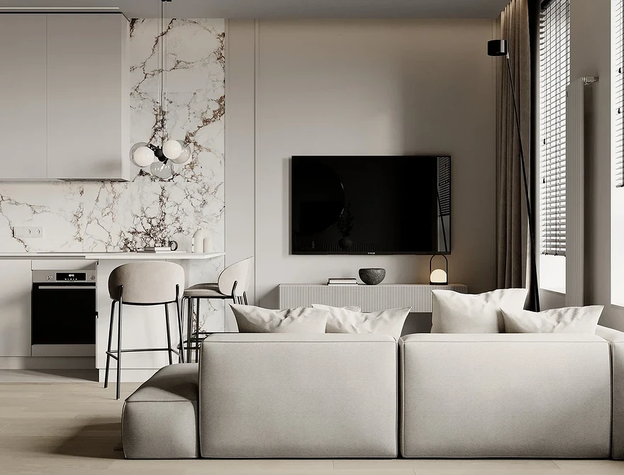 Текстильний білий диван Білий диван з текстильною оббивкою в кімнаті з дерев'яною підлогою та декором.