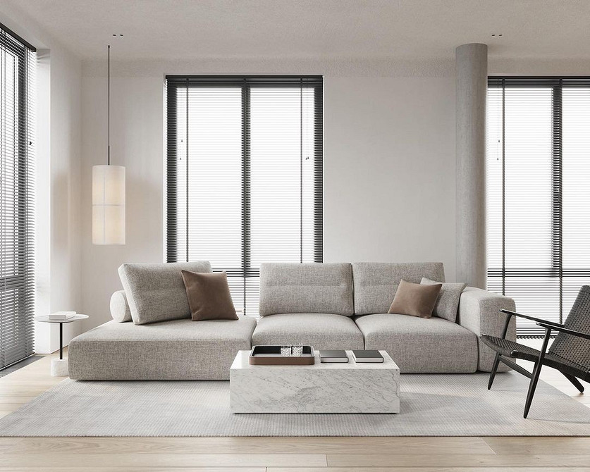 Затишна вітальня з бежевим диваном, каміном та теплим освітленням для релаксу.