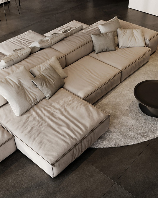 Бежевий диван з подушками Бежевий диван з декоративними подушками, що підкреслюють затишок оселі.