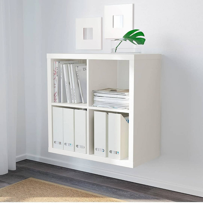 Стелаж Каллакс в якості тумби під телевізор у вітальні, сучасний дизайн