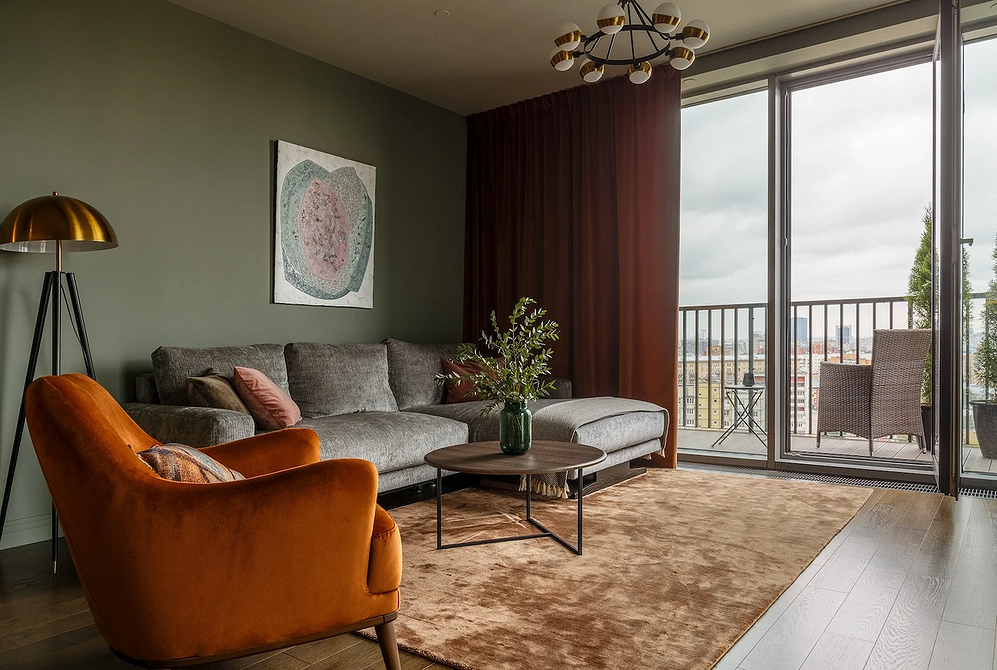 Меблі: текстурний баланс Гармонійне поєднання меблів в інтер'єрі вітальні з використанням різних текстур.