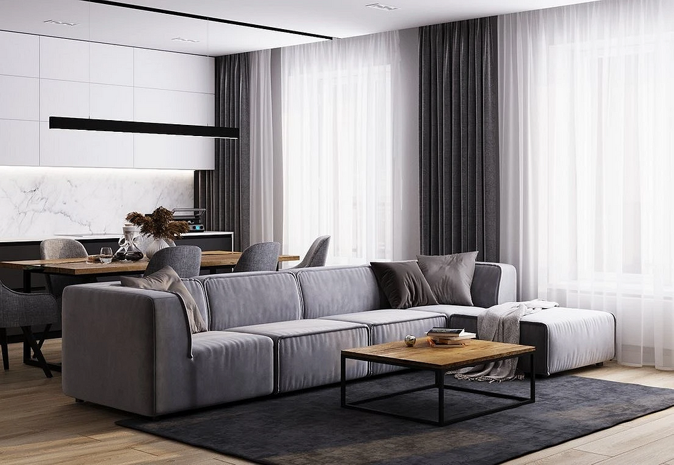 Сучасний інтер'єр вітальні з великим диваном: мінімалізм та функціональність меблів