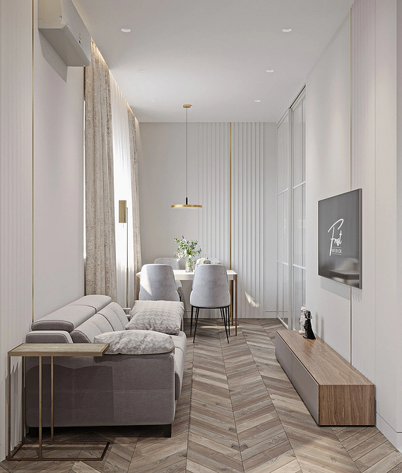 Стильний монохромний диван в сучасній вітальні з акцентними подушками.