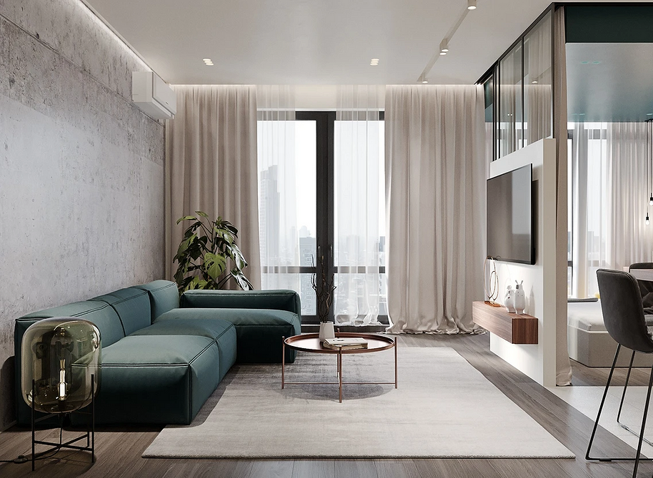 Світлий диван у монохромному інтер'єрі вітальні з плавними лініями та мінімалістичним декором.