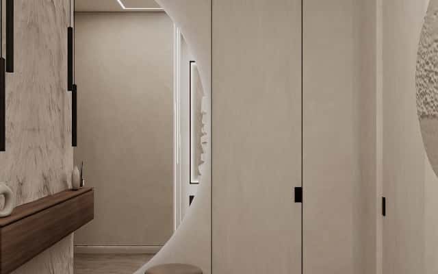 Стильний інтер'єр трикімнатної квартири у світлих тонах з сучасними меблями.