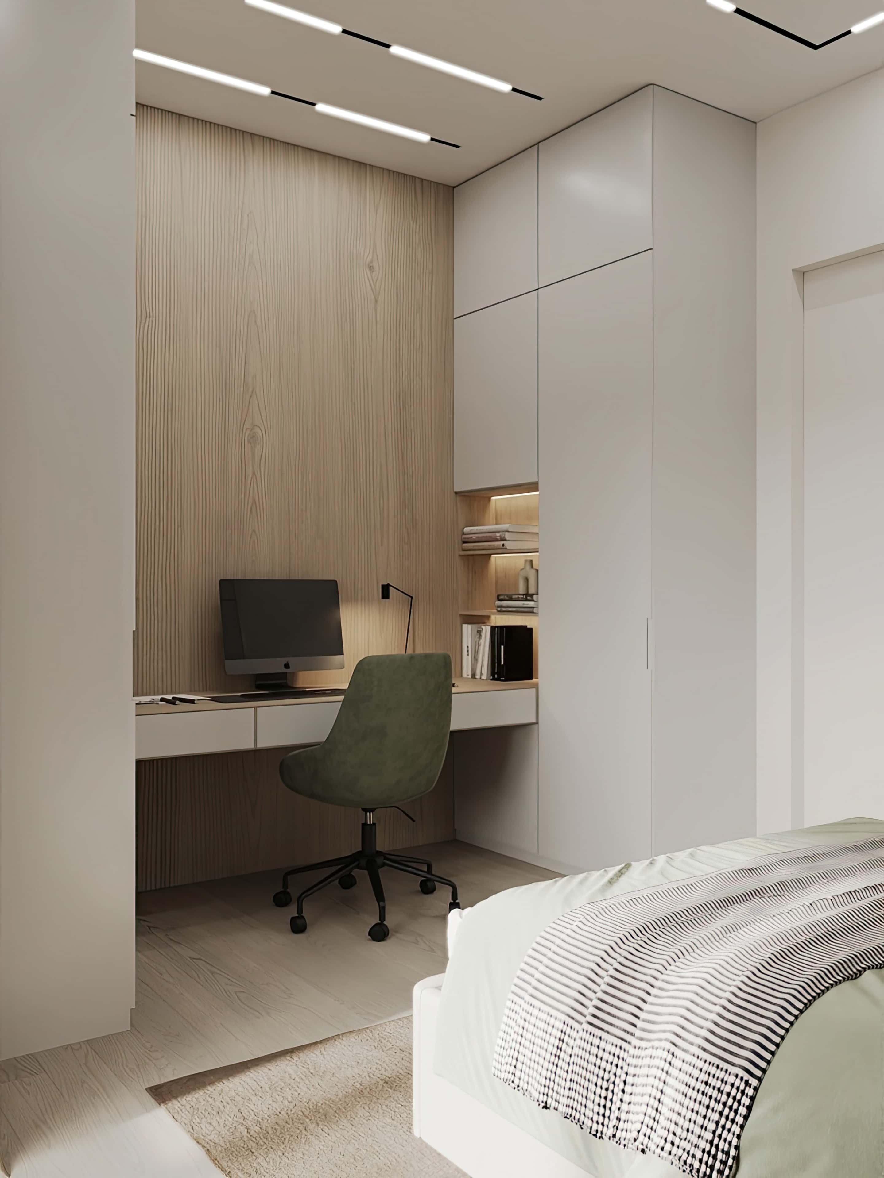 Сучасний дизайн трикімнатної квартири: мінімалістична кухня з білими фасадами та дерев'яною стільницею.