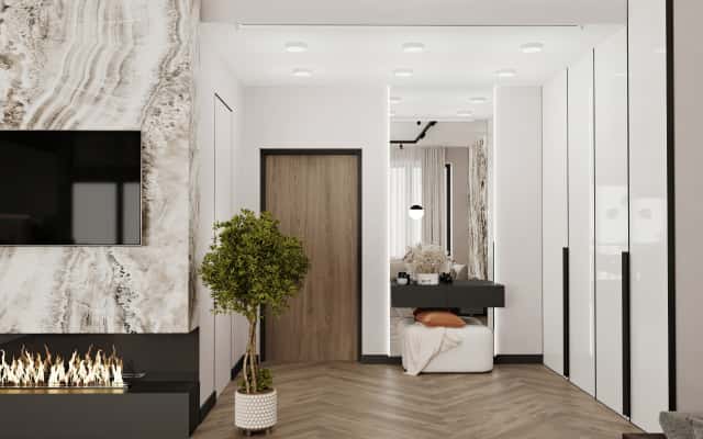 Затишний бежево-коричневий інтер'єр трикімнатної квартири з текстильними акцентами.