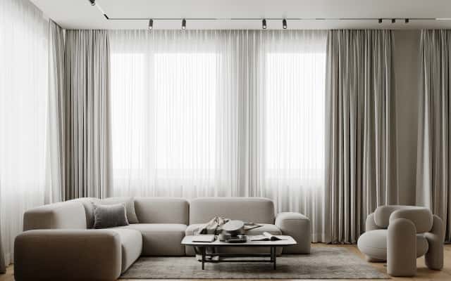 Стильний інтер'єр трикімнатної квартири 2026 в мінімалістичному стилі з природним освітленням.