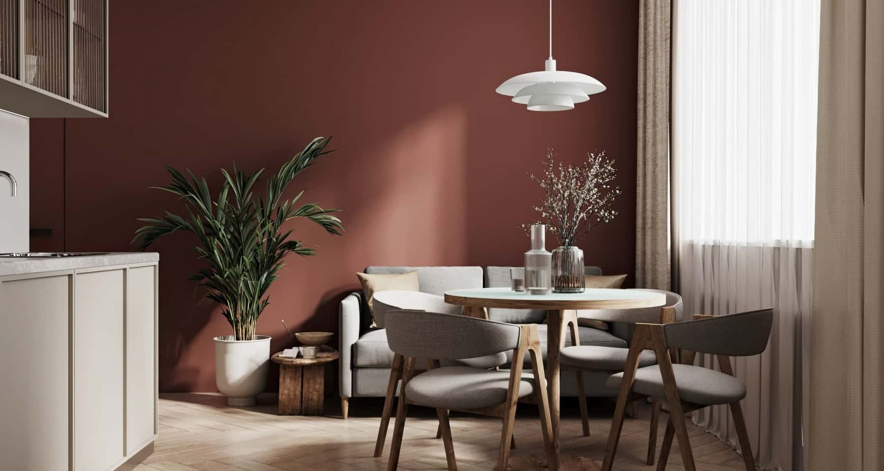 Вітальня в трикімнатній квартирі: великий диван, журнальний столик та килим.