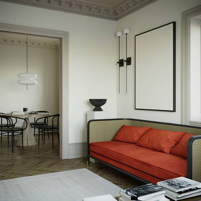 Диван у скандинавському стилі Сучасний інтер'єр з яскравим диваном у скандинавському стилі, що створює затишну атмосферу.