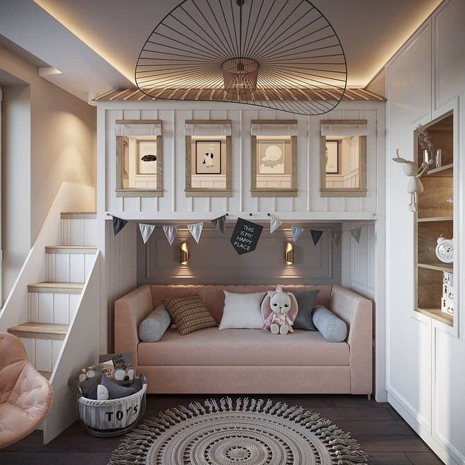 Інтер'єр дитячої кімнати з двоярусним ліжком, диваном та зручною робочою зоною.