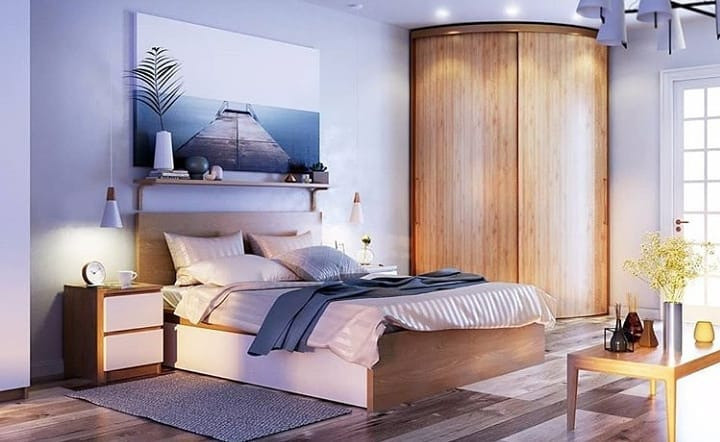 Організація одягу Інтер'єр спальні з кутовою шафою-купе: зручне рішення для організації зберігання одягу.