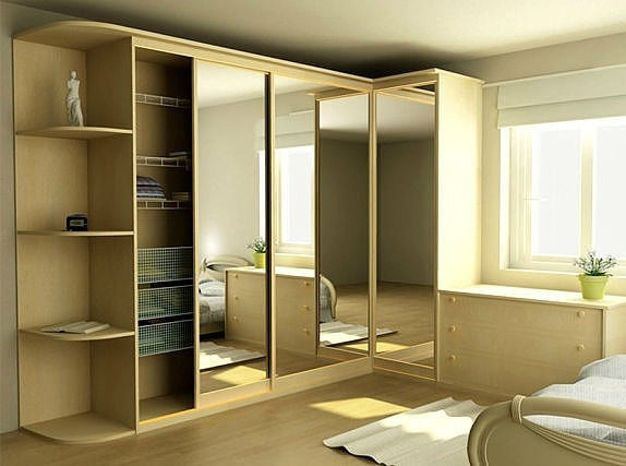 Світла кутова шафа-купе в просторій спальні: ефективне зберігання одягу та речей.