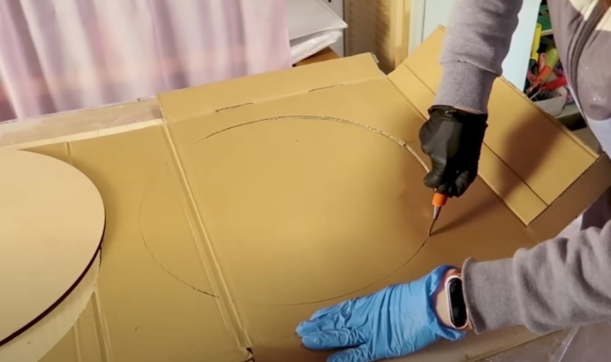 Комфортний пуфік з коробки: ідеї та поради для створення своїми руками.