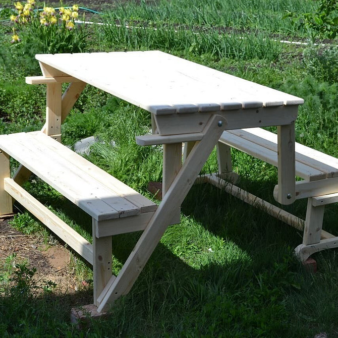 Трансформація дерев'яної лавки в стіл: зручні садові меблі своїми руками.