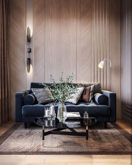 Диван з велюровою оббивкою на дерев'яних ніжках у затишній вітальні, стиль 2026.