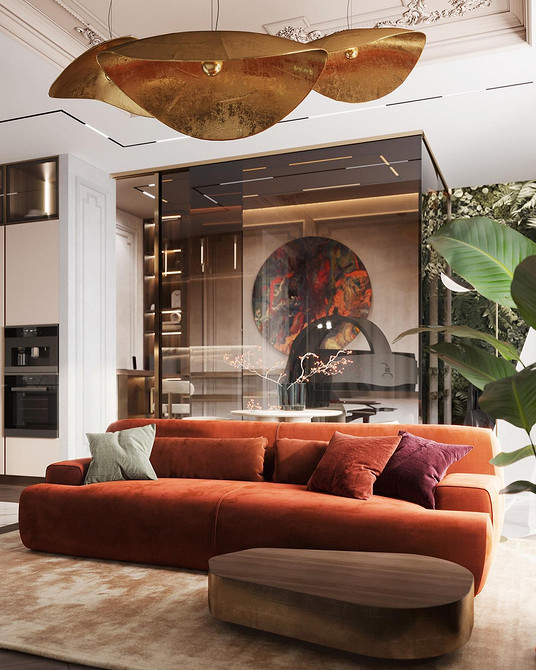 Червоний велюровий диван в інтер'єрі з декоративними подушками: акцент на текстуру тканини.