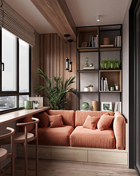 Сучасний інтер'єр з червоним диваном і коричневими елементами для стильної вітальні.