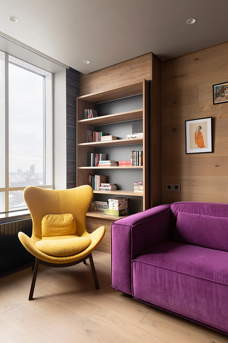 Сучасне велюрове крісло: стильний дизайн, зносостійка тканина та гармонія в інтер'єрі кімнати.