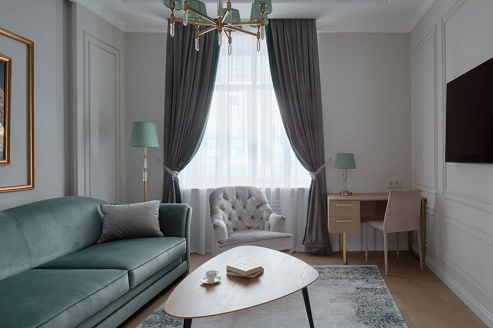 Висока спинка Стильне крісло з високою спинкою: світлий інтер'єр, вибір крісла для відпочинку.