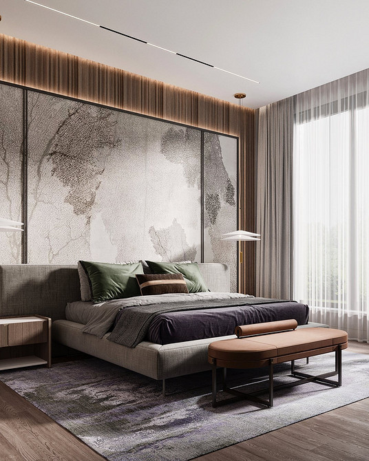 Сучасна спальня з ліжком з м'яким узголів'ям та оригінальним освітленням.