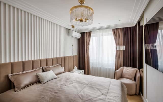 Дизайн інтер'єру квартири після ремонту в стилі неокласика для сімейного життя