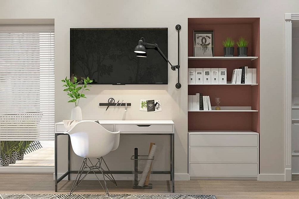 Мінімалістична світла ніша для телевізора з дерев'яними акцентами у вітальні.