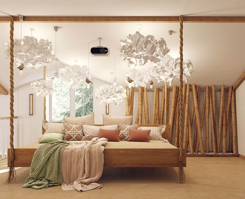 Сучасний дизайн спальні з підвісним ліжком для легкості та простору.