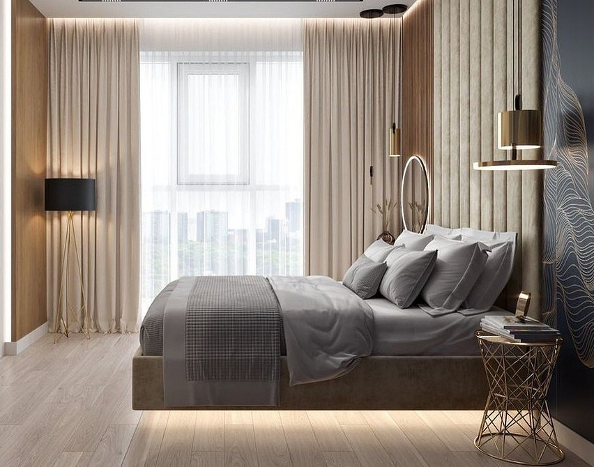 Затишна спальня з парячим ліжком, м'яким освітленням і декоративними подушками, дизайн 2026.
