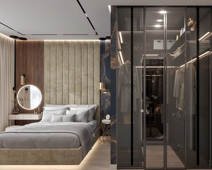 Простора спальня з парячим ліжком, килимом з довгим ворсом та декоративними рослинами. Дизайн 2026.