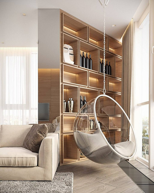 Підвісне крісло з металевим каркасом: сучасний дизайн для стильної вітальні.