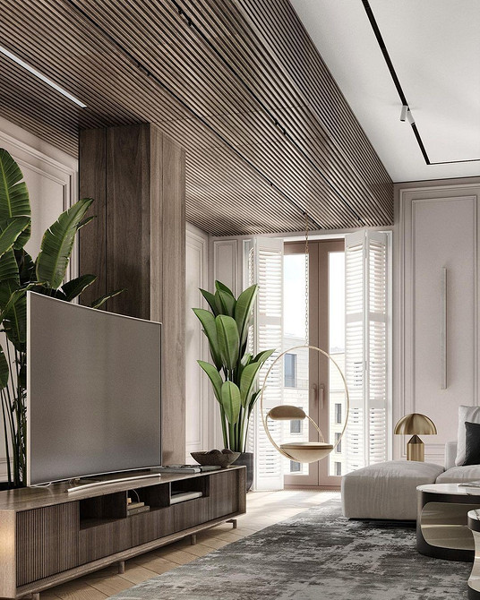 Біле підвісне крісло в світлій кімнаті, елегантне рішення для відпочинку.