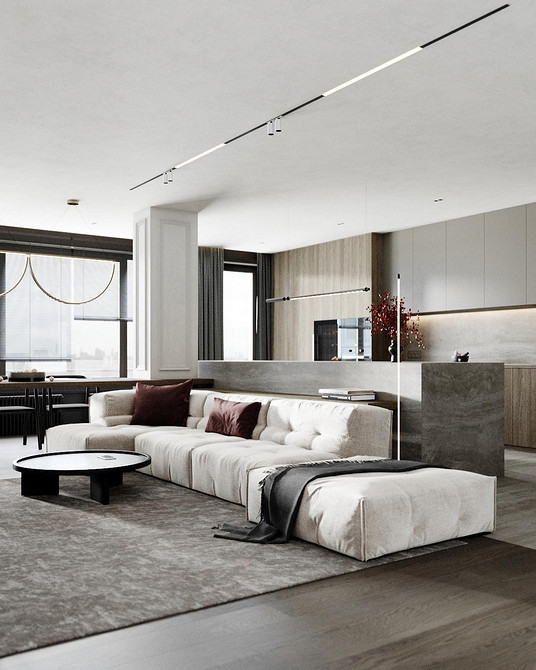 Дизайн вітальні Сучасний дизайн інтер'єру вітальні з акцентом на м'який і комфортний диван.